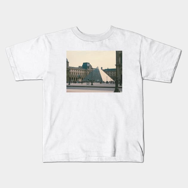 Louvre and a lonesome bicycle Kids T-Shirt by P.E. Fireisland